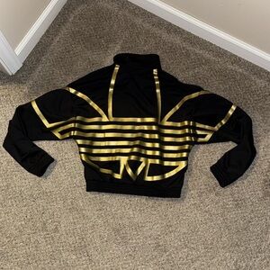 NWOT Women’s Adidas jacket with gold foil logo on back size XS